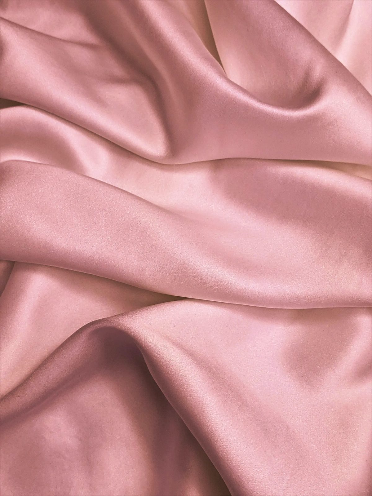 Blush-pink silk in soft folds